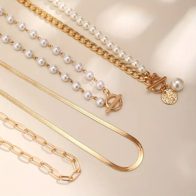 Set collana vintage con perla e catena a maglia serpente | Oro